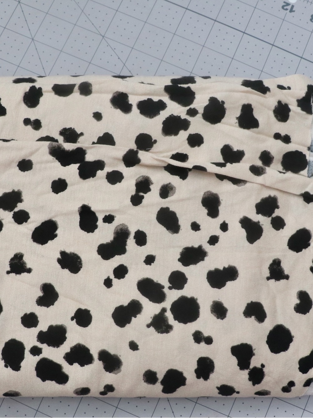 Tan and black spotted rayon/lycra jersey knit, 2 yard